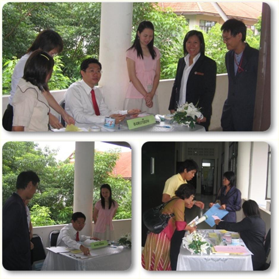 บรรยากาศที่โต๊ะลงทะเบียนหน้าห้องจัดประชุม